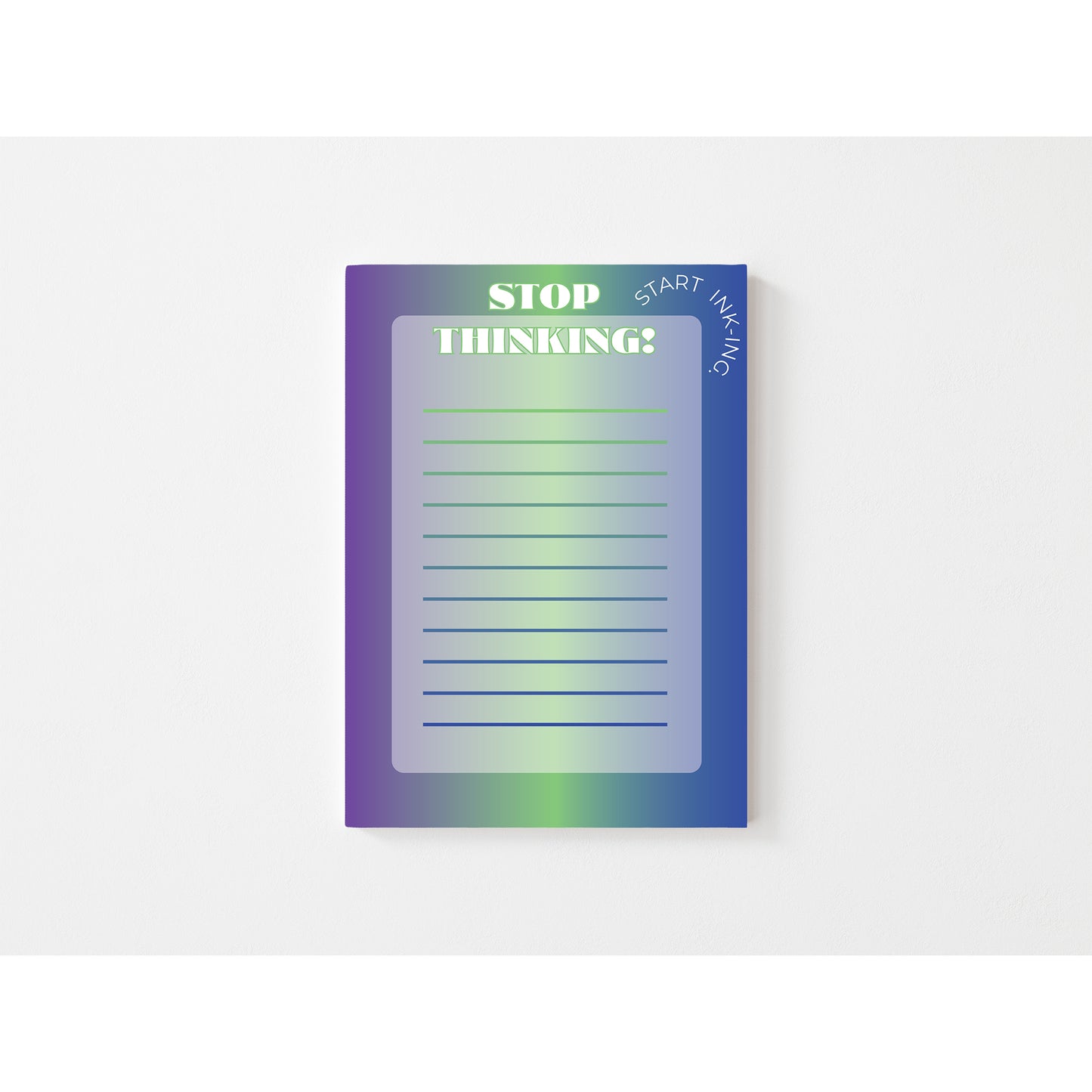 Notepad with gradient cover and motivational text on a white background