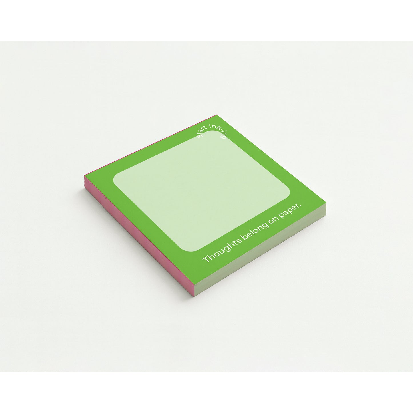 A green notepad with a clean white space for writing.