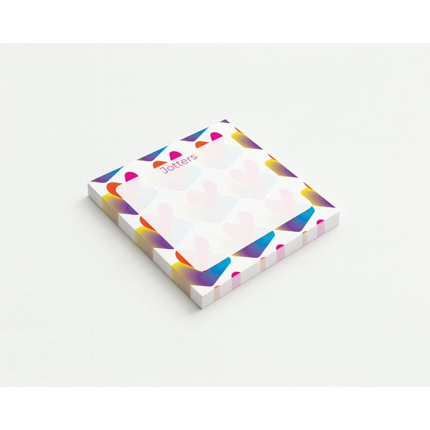 Colorful geometric patterned notepad on a white background