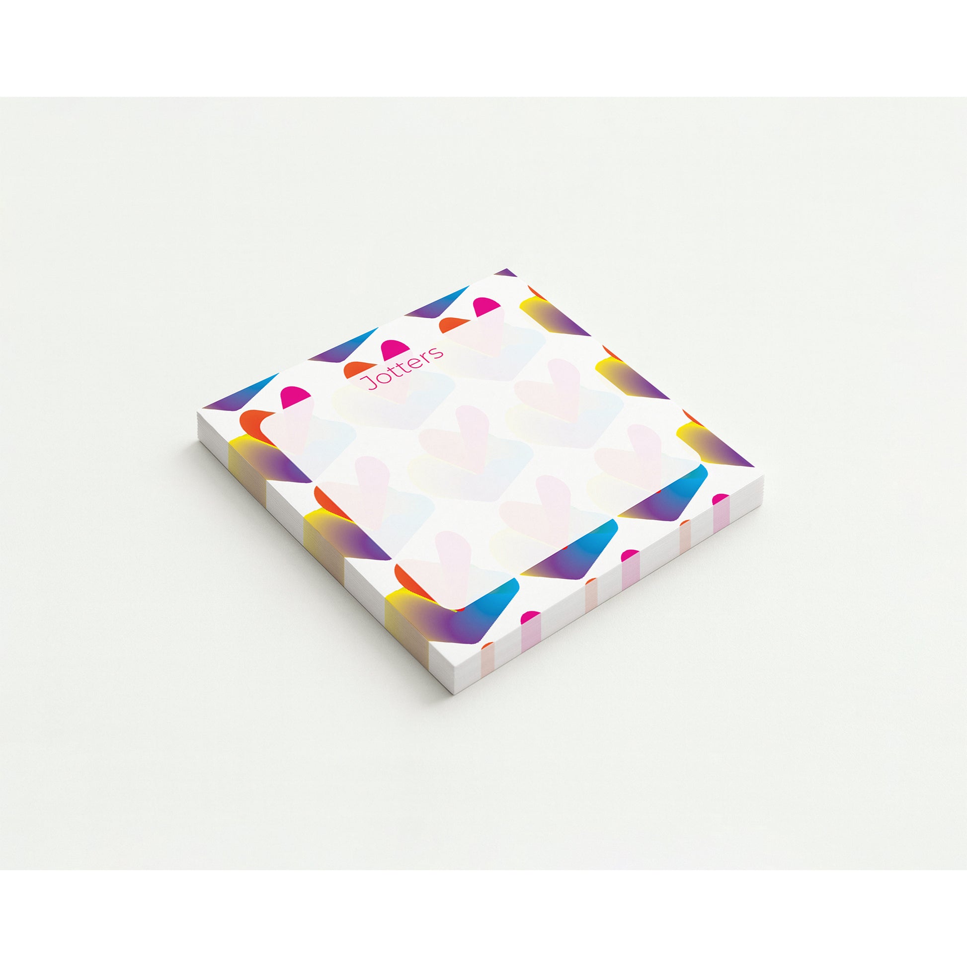 Colorful geometric patterned notepad on a white background