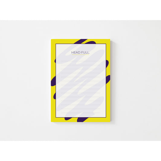 Notepad with a yellow frame and purple abstract design on a white background
