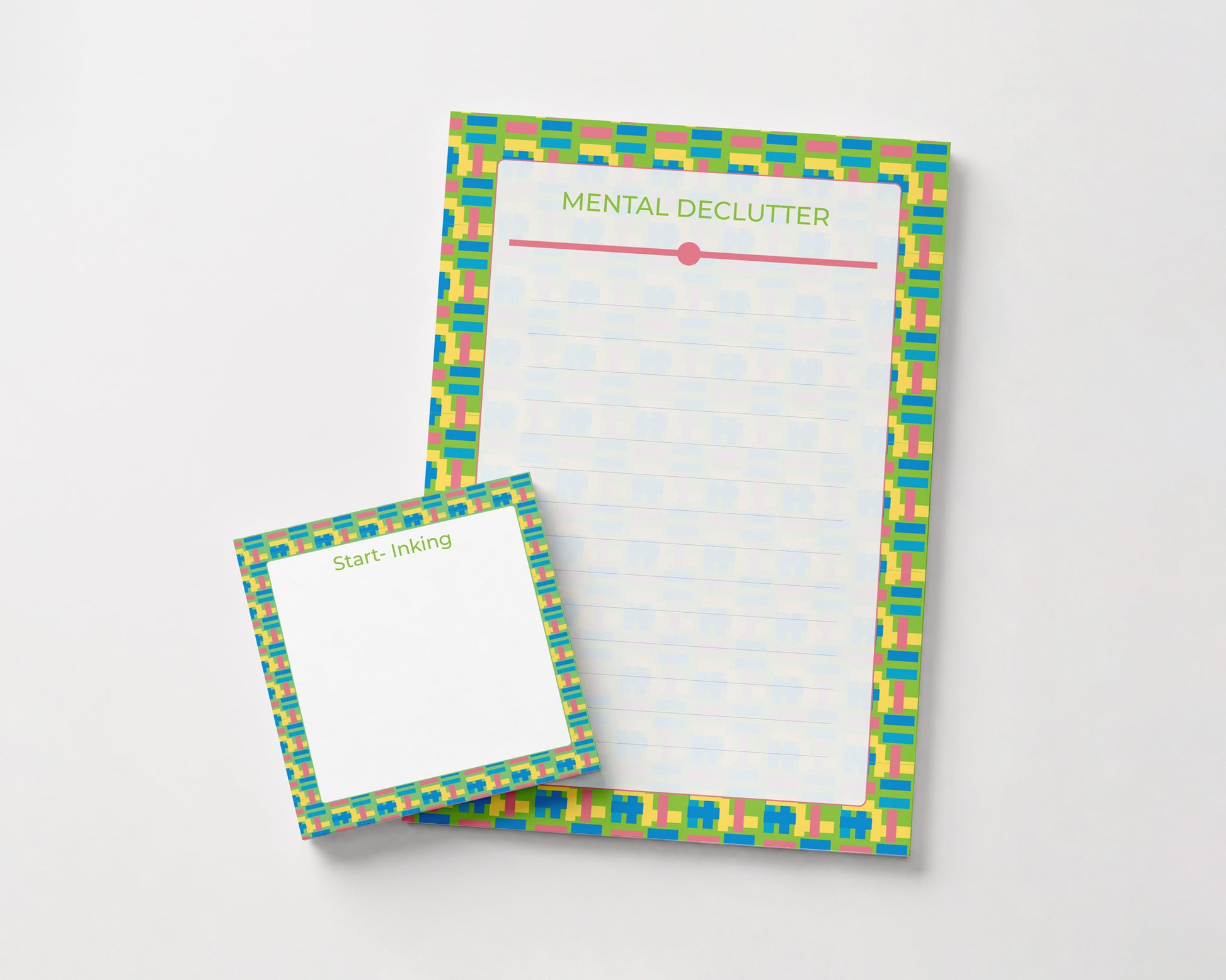 Matching Mental Declutter and Start Ink-ing notepad set featuring a green, blue, and yellow geometric mosaic border with a 5x7 lined notepad and coordinating 4x4 memo pad by Ovathink Ink Co.